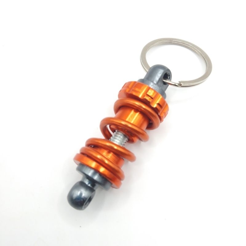 พวงกุญแจโช๊คอับ พวงกุญแจเท่ๆ ส่งจากประเทศไทย