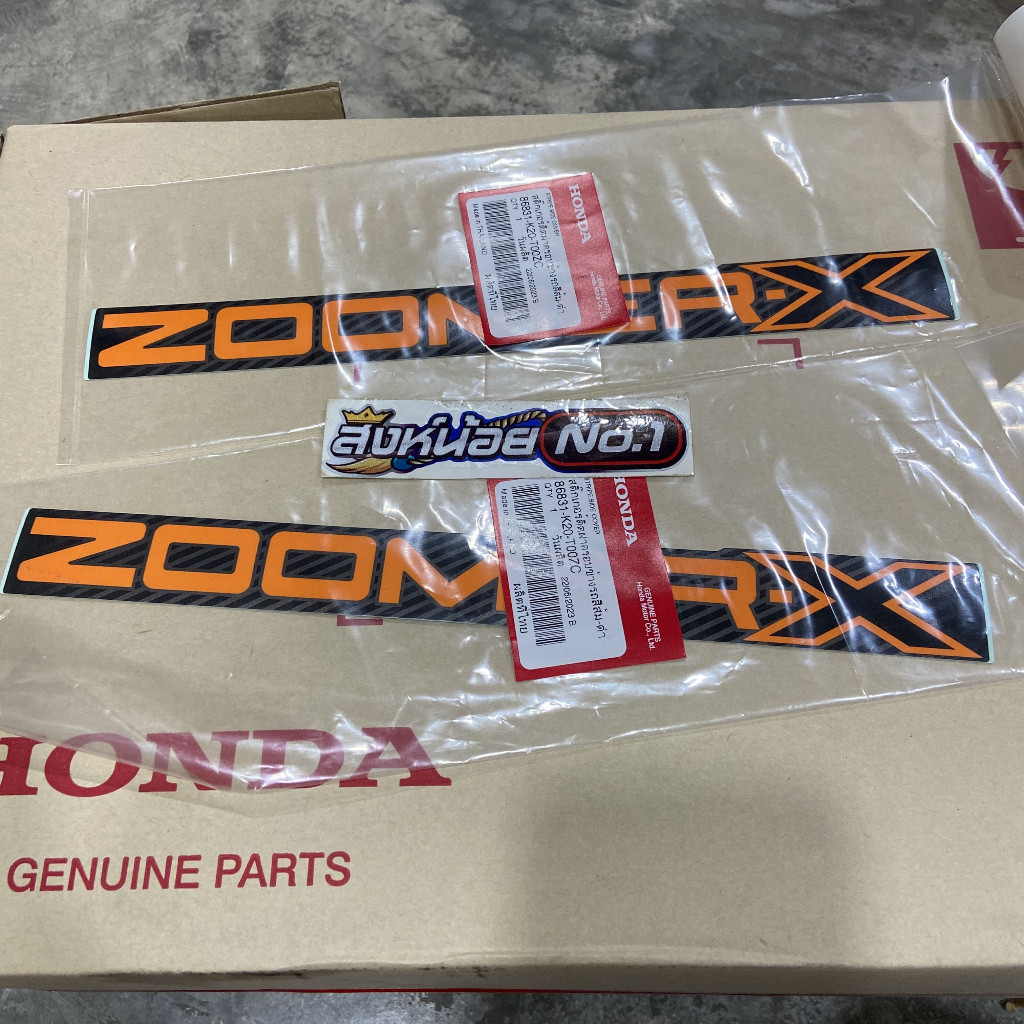 สติ๊กเกอร์ติดรถ ZOOMER X (2012-2014) สีส้ม แท้ศูนย์ HONDA (1ชุดได้2ชิ้น)