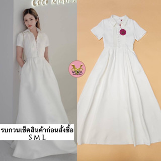 Dress ตัวยาว แขนสั้นคอปก ตีเกล็ดด้านหน้า แต่งกระดุมเรียงด้านหน้า ช่วงเอวจับจีบเข้ารูป กระโปรงบานทิ้งตัวสวย เจาะกระเป๋าด้