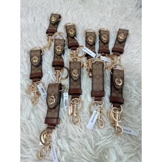 💚แท้💯 พร้อมส่ง💚 พวงกุญแจ ห้อยกระเป๋า COACH 49314 TRIGGER SNAP BAG CHARM IN SIGNATURE CANVAS