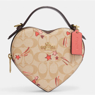 กระเป๋าสะพาย Heart Crossbody In Signature Canvas With Heart And Star Print