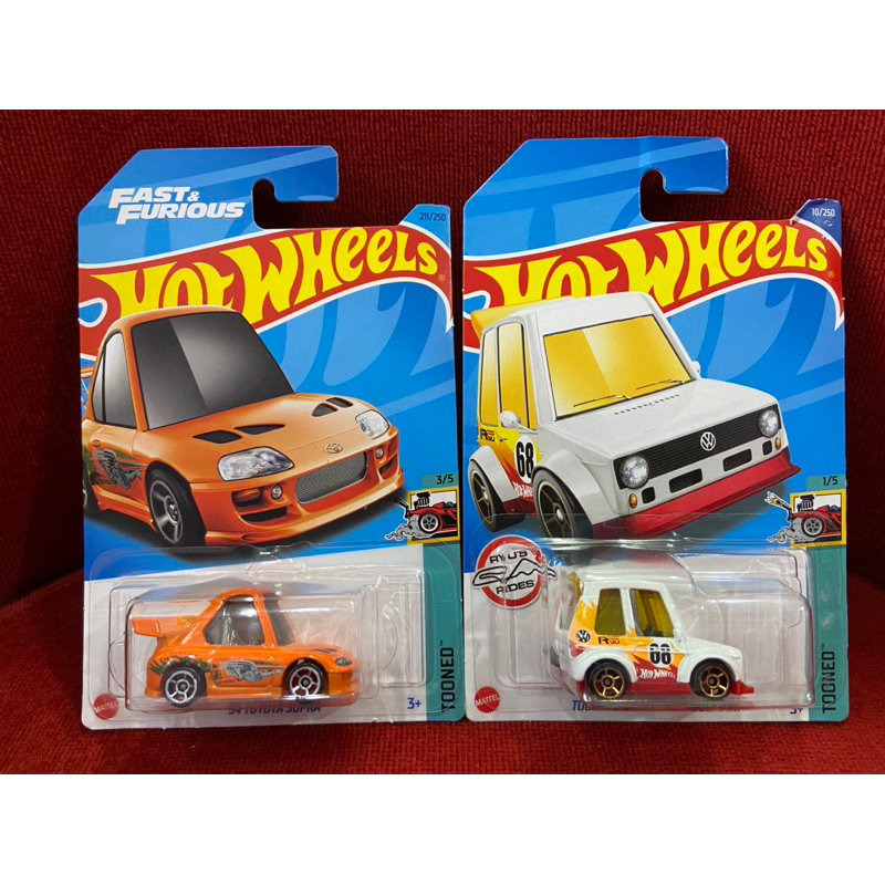 HOT WHEELS ‘94 TOYOTA SUPRA(TOONED), TOONED VOLKSWAGEN GOLF MK1 แพคสวย ของแท้ %