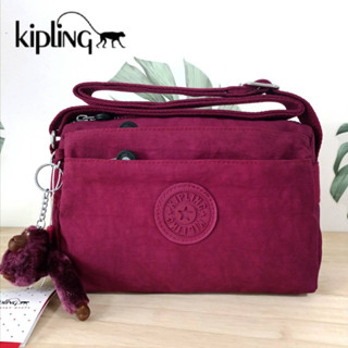 กระเป๋าสะพายข้าง KIPLING Mini Crossbodybag กระเป๋าสะพายข้างขนาดเล็กสีแดง ขนาดกะทัดรัด ผลิตจากวัสดุ Nylon+Polyester100%