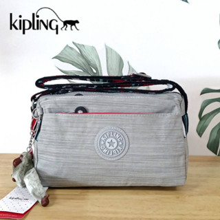 กระเป๋าสะพายข้าง KIPLING Mini Crossbodybag กระเป๋าสะพายข้างขนาดเล็กสีเทา ขนาดกะทัดรัด ผลิตจากวัสดุ Nylon+Polyester100%