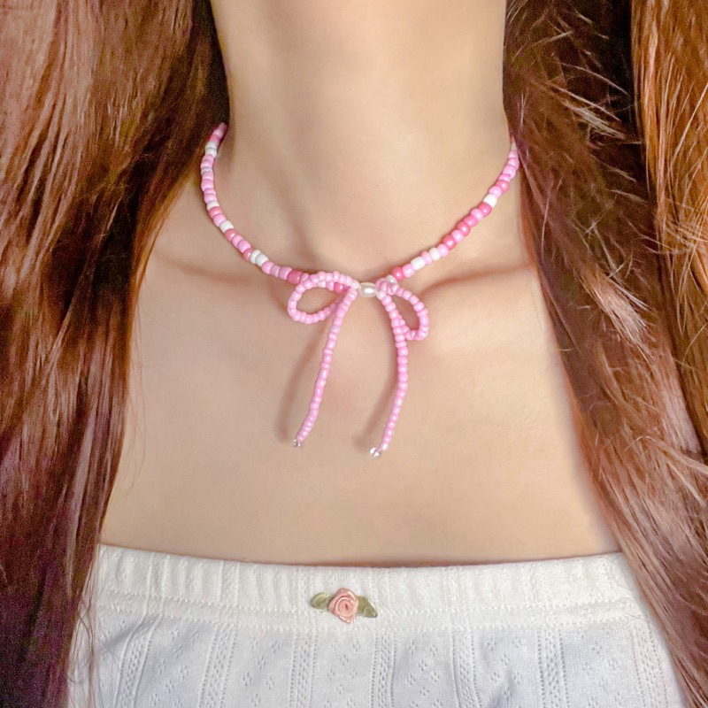 สร้อยลูกปัดโบว์ชมพู (พร้อมส่ง)