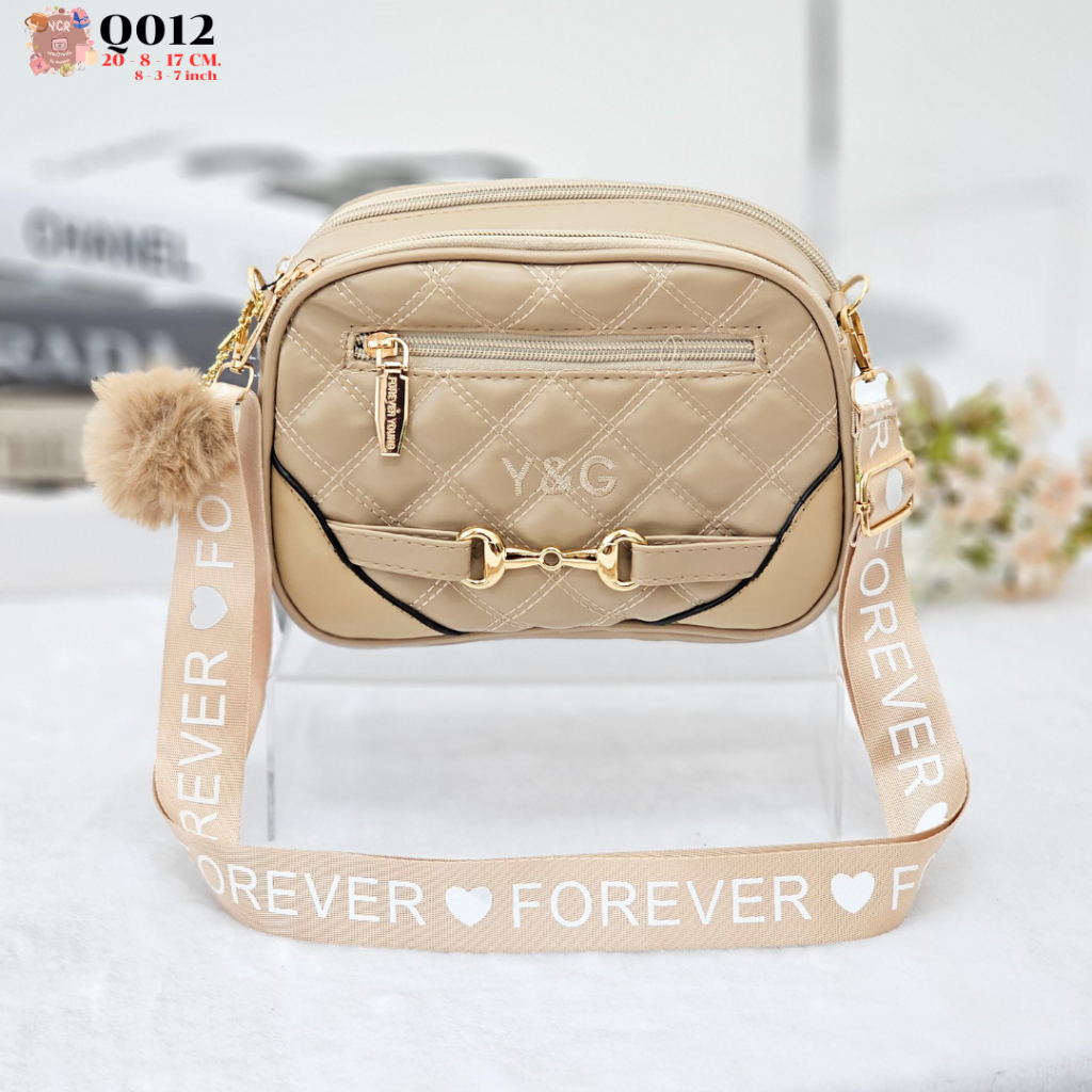 YNG กระเป๋าสะพายข้างทรงหมอน คาดเหล็กทอง สายสปอร์ตสีพาสเทล รุ่นQ012
