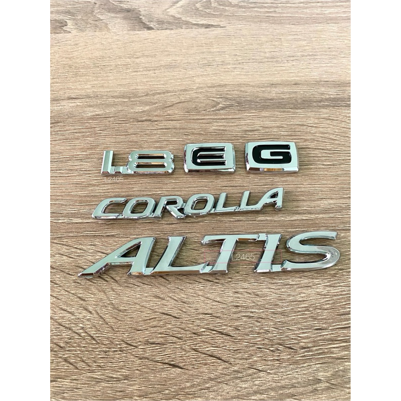 โลโก้ 1.8 E , G COROLLA ALTIS ราคาต่อชิ้น สีเงิน