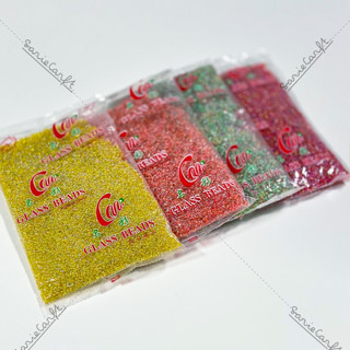 (ถุงใหญ่) ลูกปัดเม็ดทราย ขนาด 3 มม. สีใส 450 กรัม คละแบรนด์