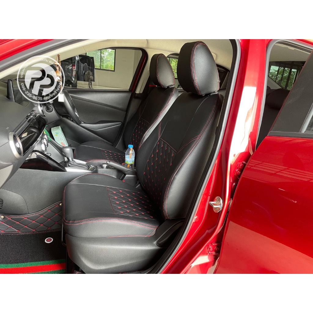 ชุดหุ้มเบาะสวมทับตรงรุ่น mazda 2  ลาย 5 D สีดำด้ายแดง.   หุ้มเบาะพีพีออโต้สปอร์ต