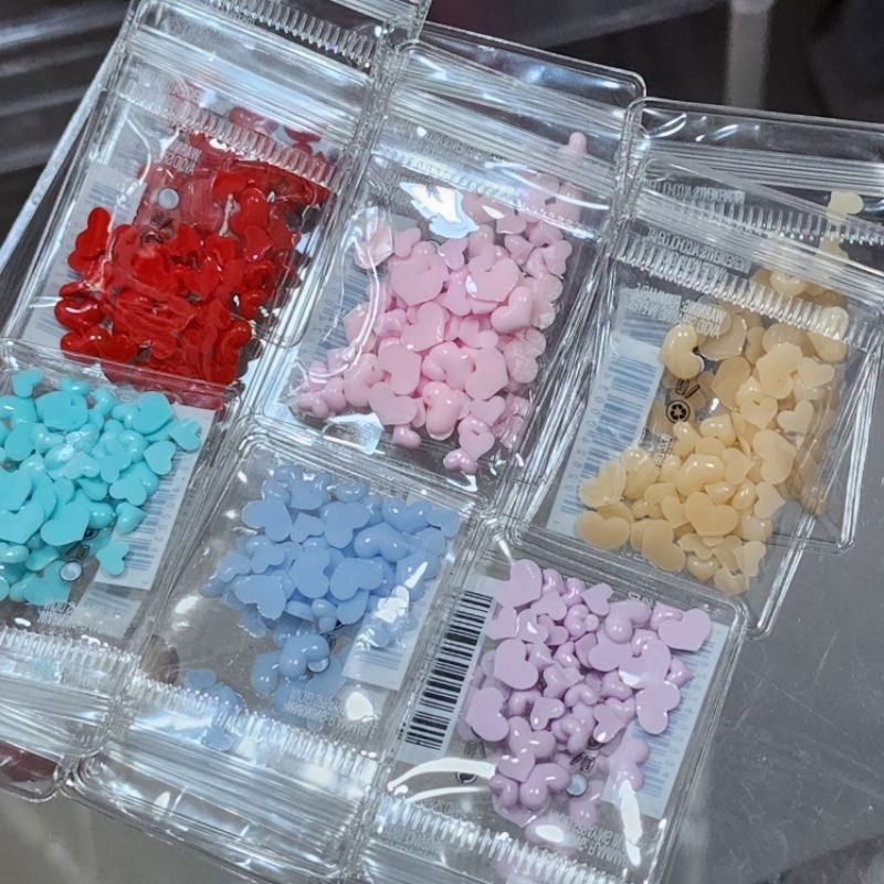 จิวเรซิ่น หัวใจ คละไซส์ อะไหล่ติดเล็บ มีให้เลือก 6 สี บรรจุซองซิปใส ! สำหรับติดเล็บ / ประดับเรซิ่น DIY