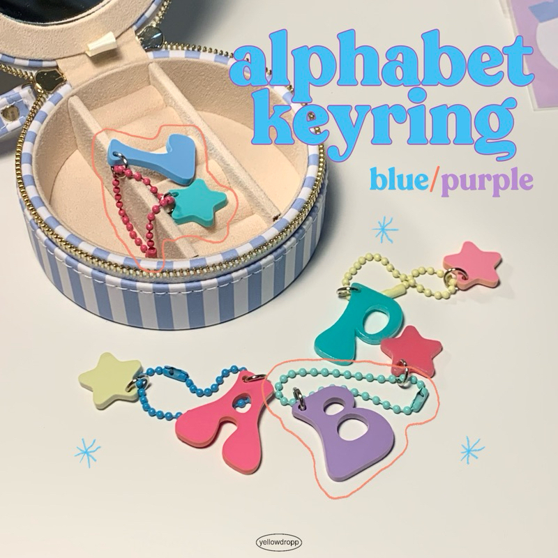 พร้อมส่ง alphabet keyring (สี blue กับ purple)