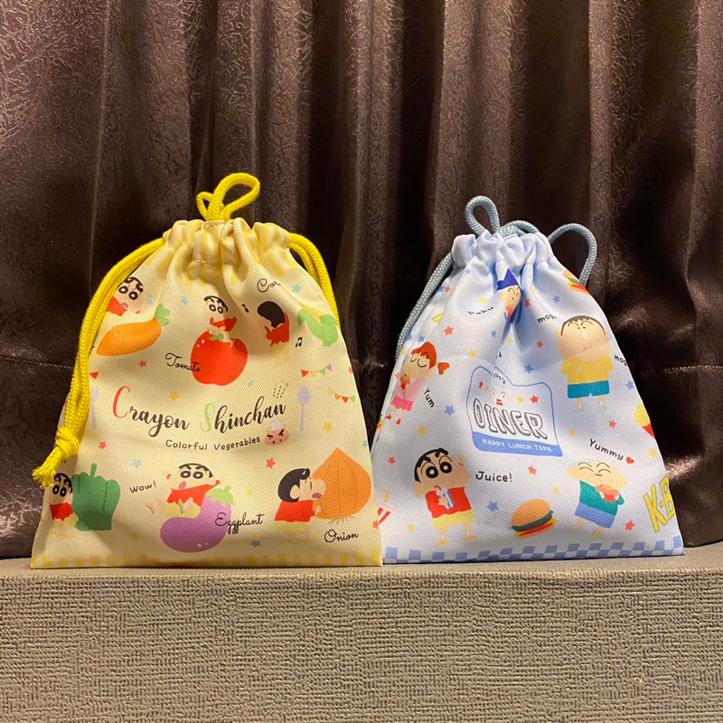 cutiepie -(พร้อมส่งทั้ง2ลาย)ถุงผ้าหูรูดชินจัง มีลาย2ฝั่ง มีช่องแยก ขนาด18x20ซม