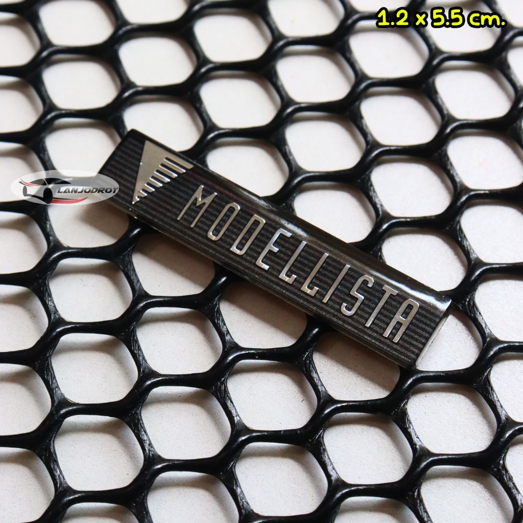 ป้าย เรซิ่น ขนาด 1.2 x 5.5 cm. ลาย MODELLISTA โมเดลลิสต้า แต่งรถ สำหรับ ชุดแต่ง NEW TOYOTA Yaris CROSS HEV 2023
