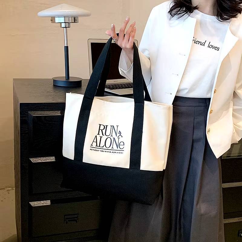 ifashionbag(IF2104) กระเป๋าผ้าแคนวาสสะพายไหล่ ใบใหญ่ มีช่องใส่ของด้านหน้าRUN
