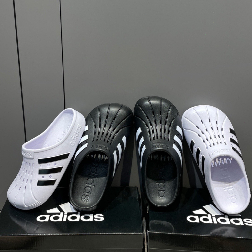 Adidas ADILETTE CLOG cavernous รองเท้าแตะลําลอง ระบายอากาศ เหมาะกับเดินชายหาด สําหรับผู้ชาย ผู้หญิง
