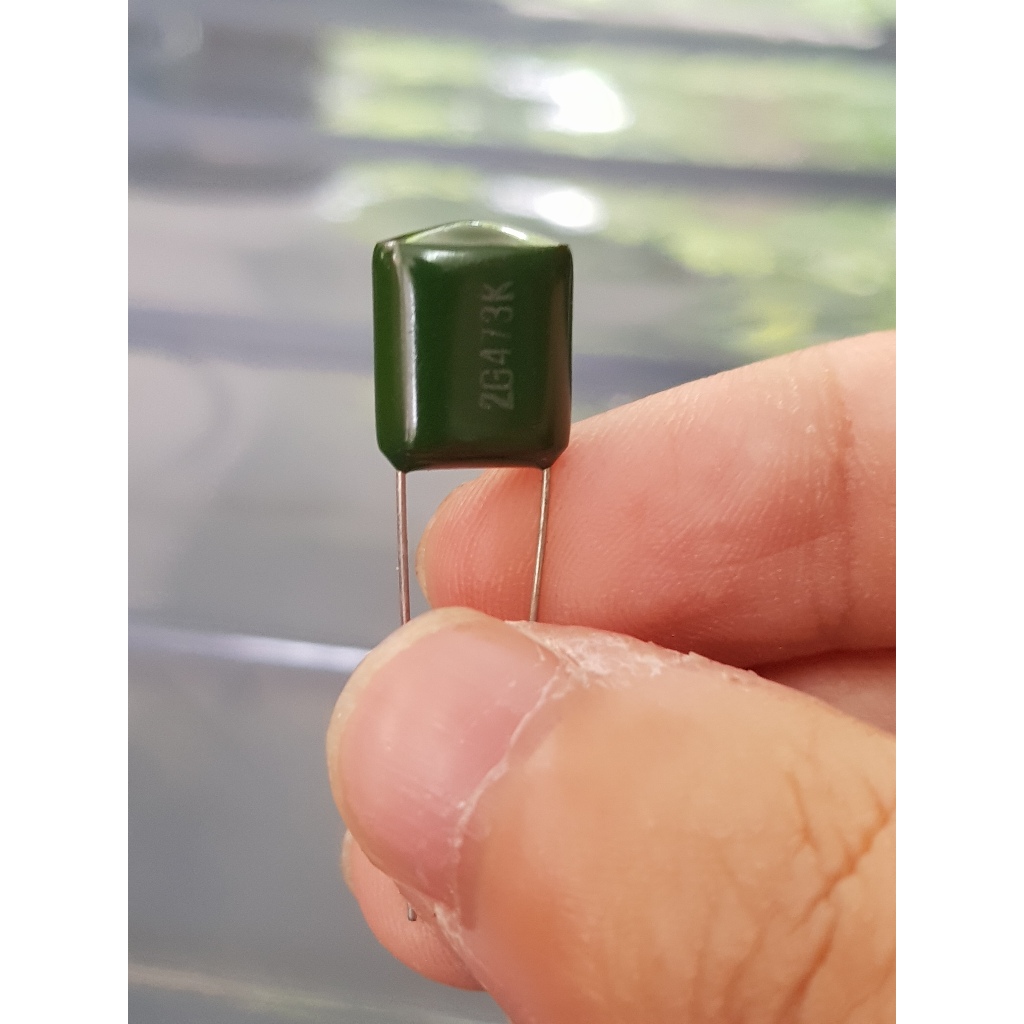 Mylar Capacitor 2G473K คาปาซิเตอร์ ค่า 0.047 uf / 400v. สีเขียว ขนาด 1 x 0.7 cm
