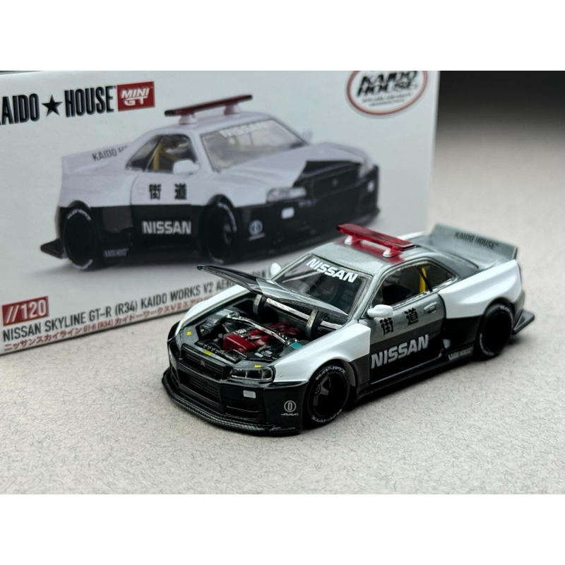 ✨ Chase Car Nissan Skyline GTR R34 Kaido Works V2 AERO Japan Police #120 Scale 1:64 ยี่ห้อ Minigt