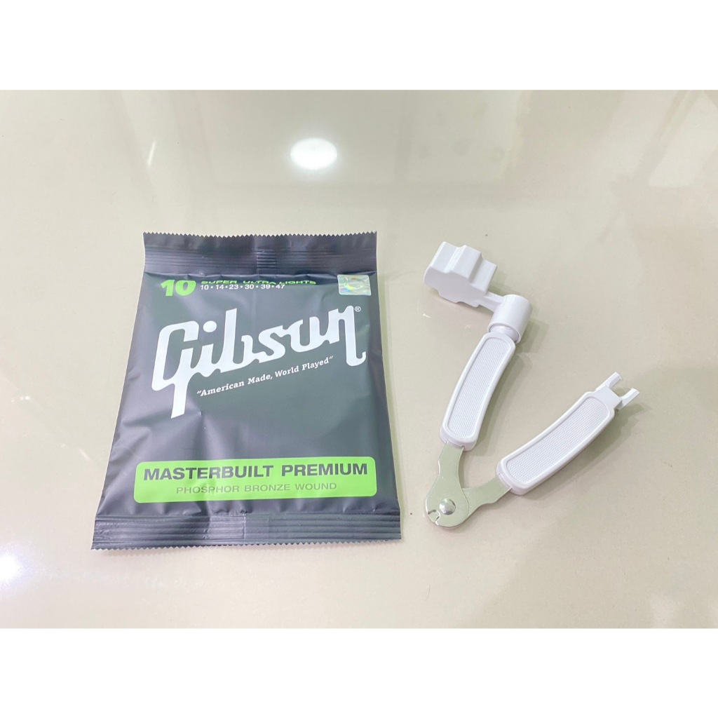 สายชุดกีต้าร์โปร่ง Gibson เบอร์10 พร้อมอุปกรณ์ตัดสายกีต้าร์ใช้งานสะดวกเปลี่ยนสายเองได้ไม่ต้องเข้าร้าน เลือกสายกีต้าร์ได้