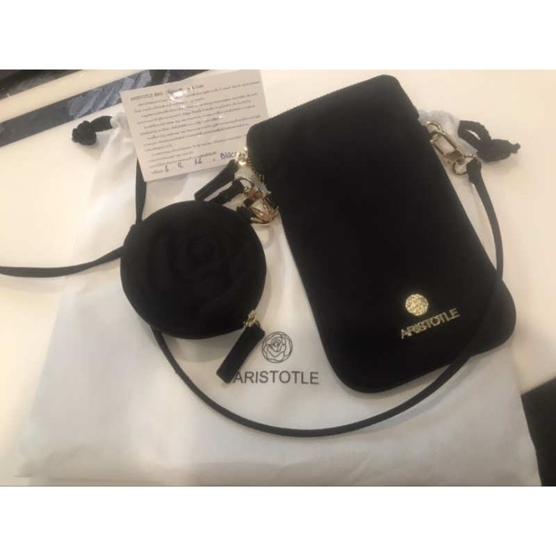 aristotle phone and coin black