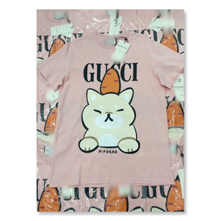 VALEN BASIC STORE 🩷🥕เสื้อยืดสีชมพู GG ลายหมาเเครอท
