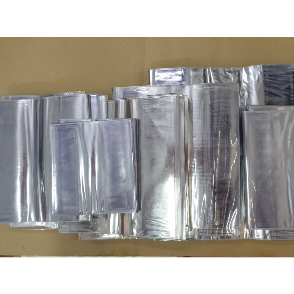 (ขายยกโหล)ปกพลาสติกใส  ไซร์ E(7.4 -13.5 นิ้ว/19- 35ซ.ม) ปกหนังสือดิกชั่นนารี่นิยายเล่มเล็กขายยกโหล