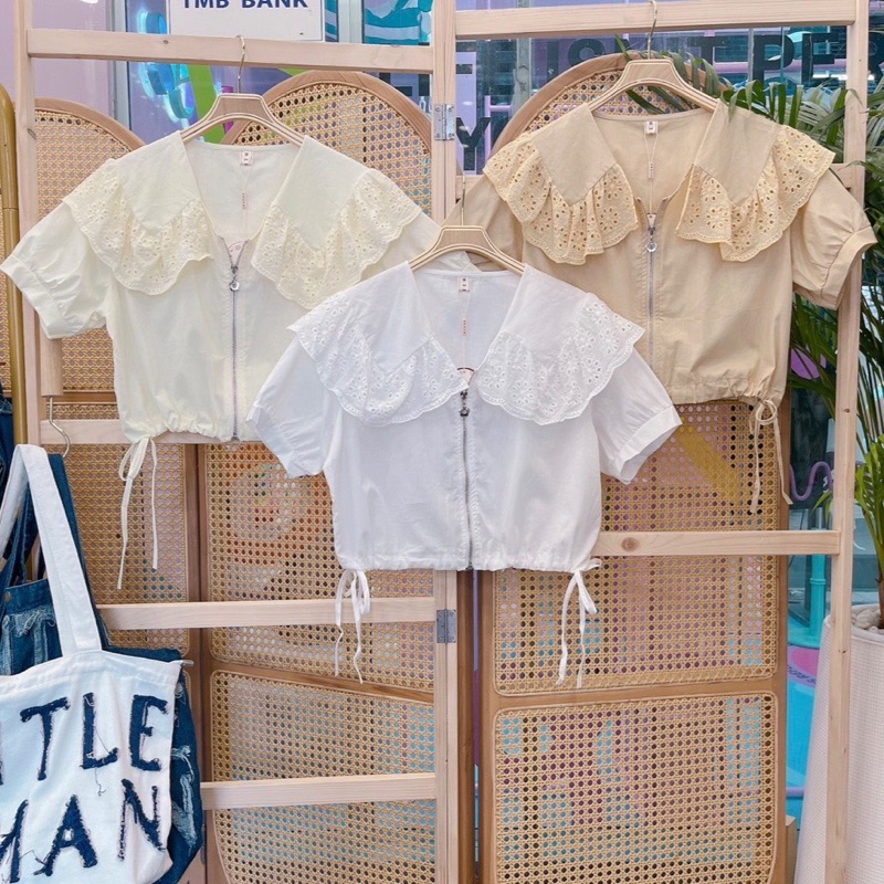 เสื้อครอป คอปกกะลาสีแต่งฉลุรูดข้าง ป้ายnida