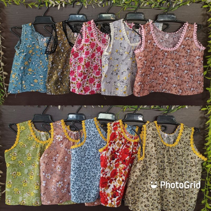 เสื้อคอกระเช้าเด็ก คละสี คละลาย ราคาตัวละ 29 บาท