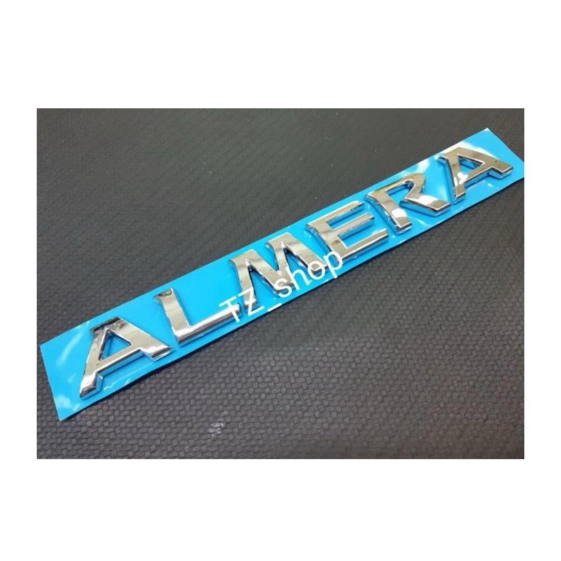โลโก้ ALMERA อักษรของ Nissan