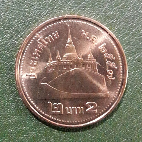 (พร้อมส่ง)เหรียญ 2 บาท สีทอง ปี 2557 ไม่ผ่านใช้ UNC พร้อมตลับ (ตัวติดอันดับที่ 1)