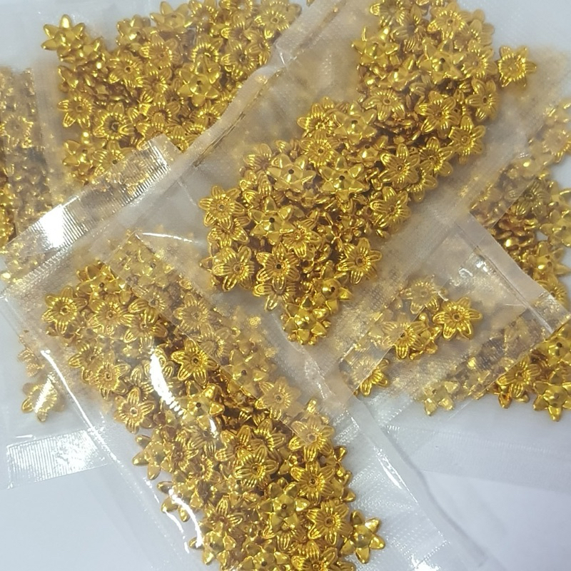 ดอกพิกุล สำหรับทำเหรียญโปรยทาน และตกแต่งต่างๆ จำนวน 100 ดอก