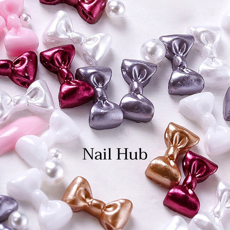 AC.201 ร้านไทย แพ็ค 20 ชิ้น พร้อมส่ง โบว์เรซินติดเล็บสีเงาวาว ขนาด 7x5mm มีให้เลือก 5 สี