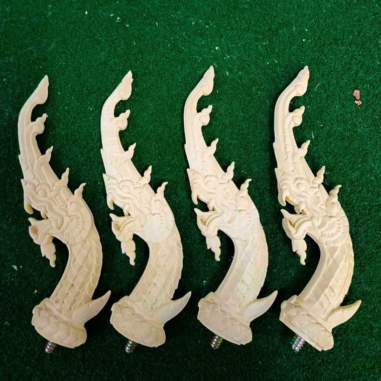 หัวพิณพญานาค ทำจากไม้โมก แกะสลักด้วยเครื่อง CNC อย่างวิจิตรศิลป์