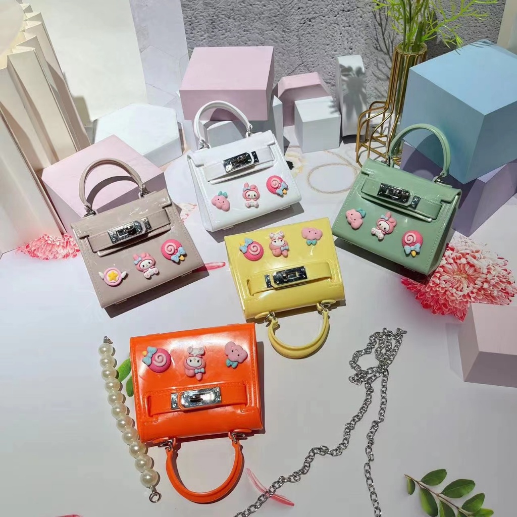 กระเป๋าผู้หญิง เจลรี่ สะพายข้างสายโซ่ตกแต่งการ์ตูนสุดน่ารัก กระเป๋าใบจิ๋ว หนังแก้ว