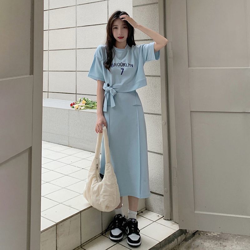 กระโปรงยาวปานกลางของผู้หญิง + เสื้อยืดผูกเชือกชุดสองชิ้น ผ้าใส่สบายและระบายอากาศได้ดี