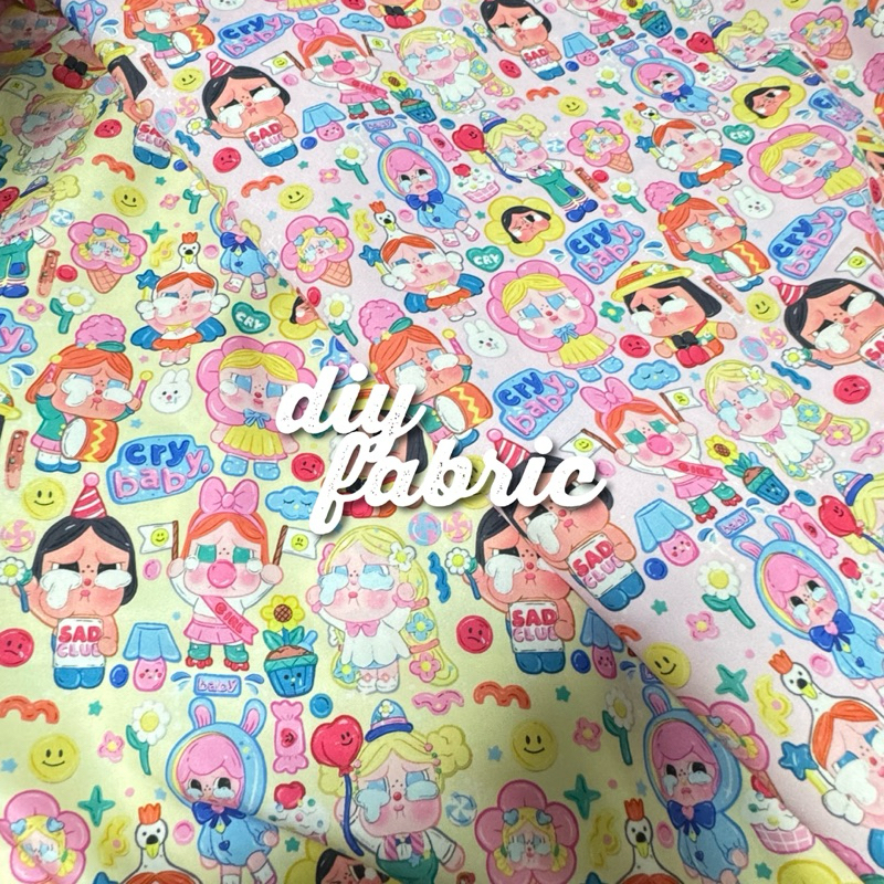 ผ้าพิมพ์ลายคลายเบบี้ crybaby popmart ลาบูบู้ น้องบู้ labubu ผ้าหลา เมตร พร้อมส่ง ผ้าไหมอีตาลี เนื้อดี 60” การ์ตูน