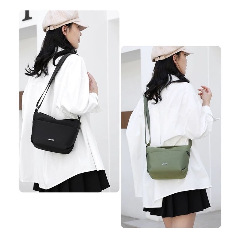 9712# กระเป๋าสะพายข้างผ้าไนลอนกันน้ำได้เหมาะสำหรับชายหญิงแฟชั่นมาใหม่ 9712#