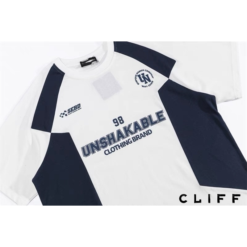 CLIFF แขนสั้นเย็บต่อกัน เสื้อยืดผู้ชาย เสื้อทรงหลวมสไตล์อเมริกัน ใส่ได้ทั้งชายและหญิง ราคา ถูกที่สุด ดีลบีเคเค แกลเลอรีภาพที่ 9