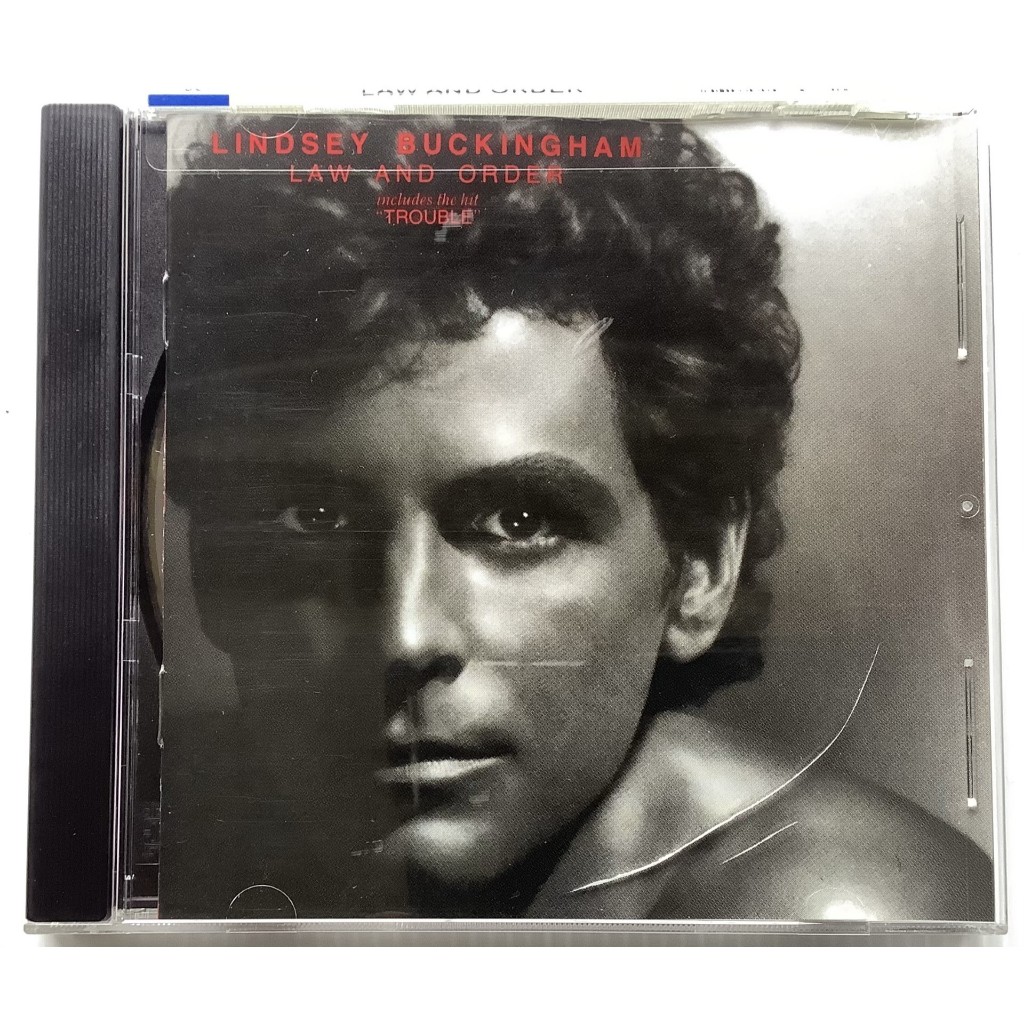 CD ซีดีเพลงวินเทจ Lindsey Buckingham มือguitarและร้องนำวง Fleetwood Mac อัลบั้ม Law and Order ลิขสิท