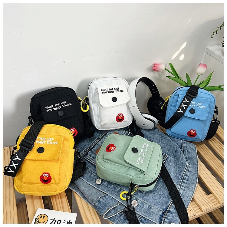 กระเป๋าสะพายแฟชั่น กระเป๋าเอลโม่ ปรับสายได้ มีหลายสี ทนทาน ผ้าแคนวาส — A