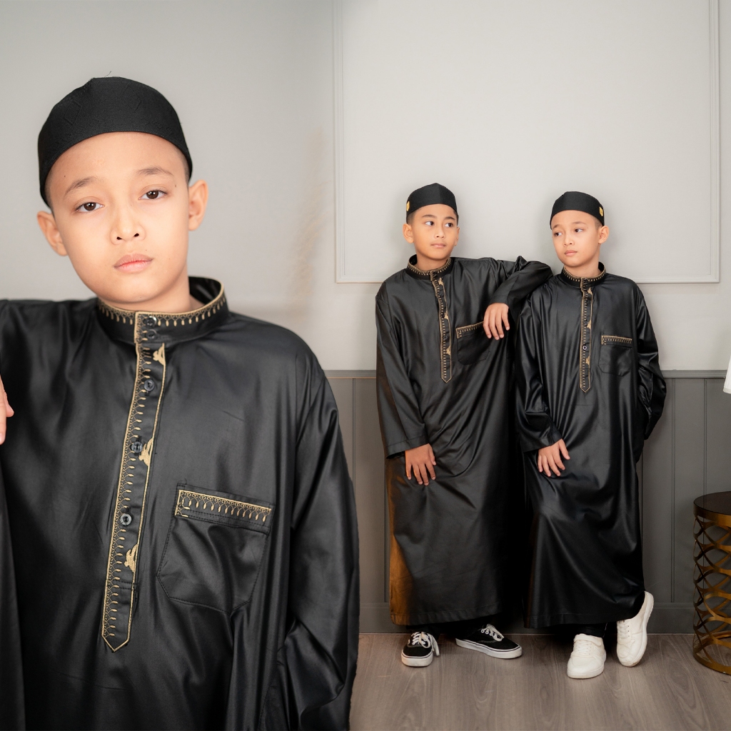 ชุดโต๊ปเด็กแขนยาวสีดำ ผ้าสปันขัดเงา ปักลายสีทองโดดเด่น ทรงสวยใส่สบาย ราคาถูก BA41วาริสมุสลิม