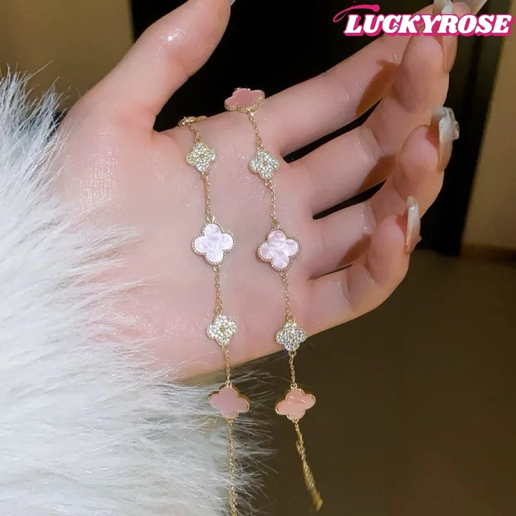 สร้อยข้อมือ ประดับเพทาย รูปดอกซากุระ สีชมพู สี่แฉก หรูหรา เครื่องประดับ สําหรับผู้หญิง
