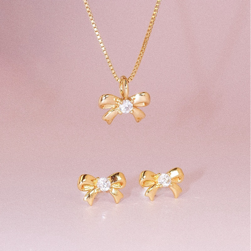 RINDA - Ribbon gem stud (gold/silver)