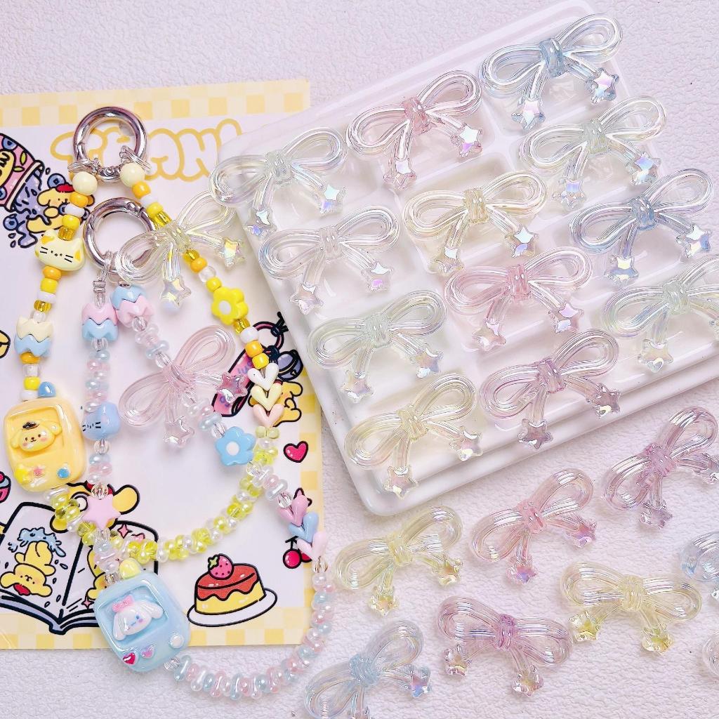 โบว์ หางดาว สีใส สีนม พาสเทล ขนาด 20x34mm อุปกรณ์งานฝีมือ งานร้อยกำไล สร้อย พวงกุญแจ ของตกต่างๆ DIY ราคา ถูกที่สุด ดีลบีเคเค