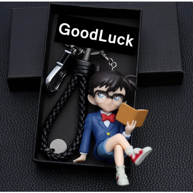 (Keychain) โคนันนักสืบพวงกุญแจตุ๊กตาโมเดลอุปกรณ์ต่อพ่วงคุโด้ชินอิจิกระเป๋านักเรียนจี้พวงกุญแจรถของขวัญ