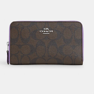 กระเป๋า Coach Medium Id Zip Wallet In Signature Canvas With Colorblock Interior