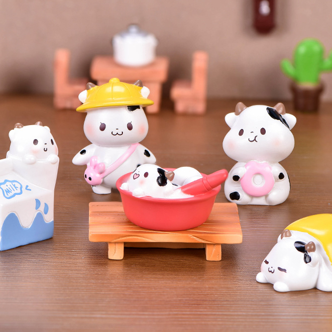 ร้านไทย ตุ๊กตาเรซิ่น น้องวัวนม ใช้แต่งสวน แต่งโต๊ะทำงาน หรือติดหน้ารถ แถมกาวฟรี
