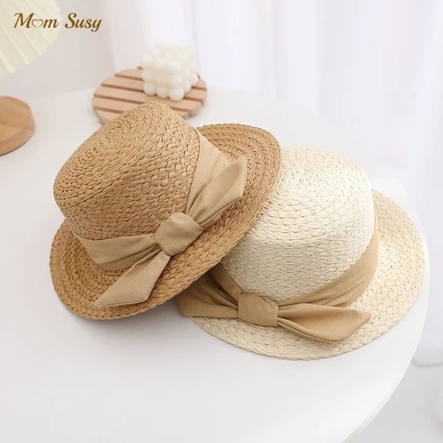 YLW SHOP หมวกสานทรงคัพเค้ก ตกแต่งด้วยโบว์น่ารักๆพร้อมส่งจากไทย A094