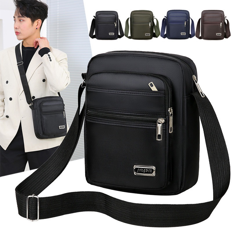 กระเป๋าสะพายผู้ชายแนวตั้งกันน้ำและทนต่อการสึกหรอผ้าออกซ์ฟอร์ดหลาย มี6ช่อง ช่องเก็บของเยอะ ใช้ได้ทั้งผู้ชายผู้หญิง