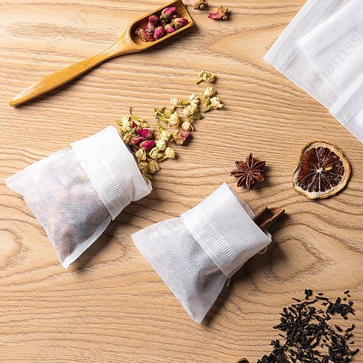 ถุงกรองชา เปล่า 100ชิ้น/แพ็ค ผ้าไม่ทอแบบใช้แล้วทิ้ง พร้อมเชือก ใส่ยาต้ม tea bag อุปกรณ์ชงชา MoMo Bakery