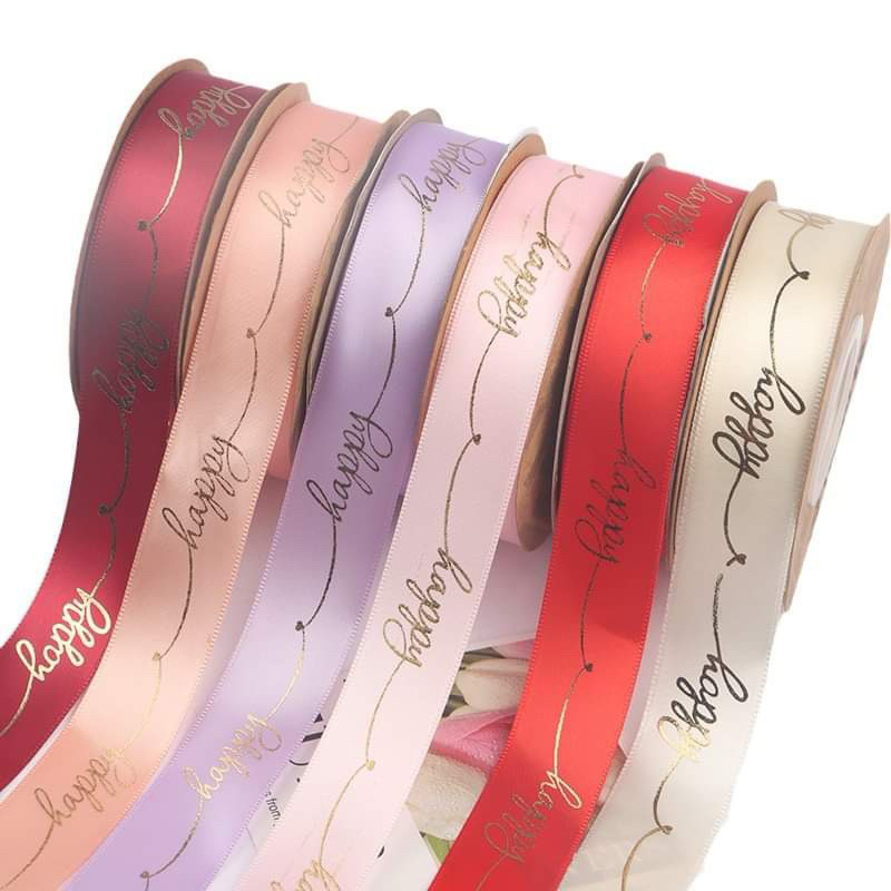 ริบบิ้นผ้าซาติน happy ขนาด 2.5 ซม ยาว 25 หลา